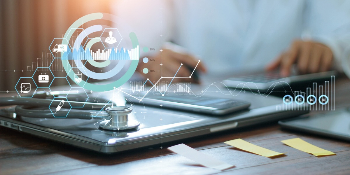 Laptop with Healthcare icons overlayed on image