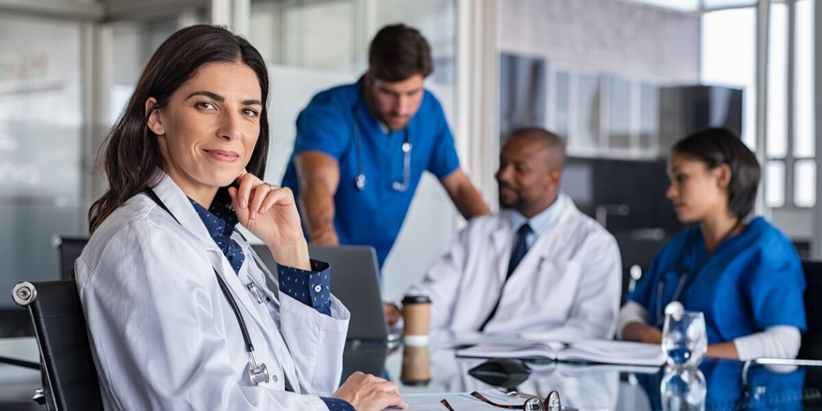 Medical Professionals sitting around a table