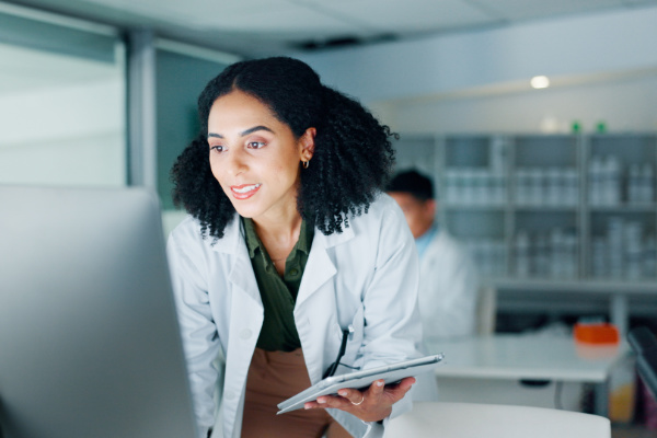 lady doctor looking at Somnoware DME Manager